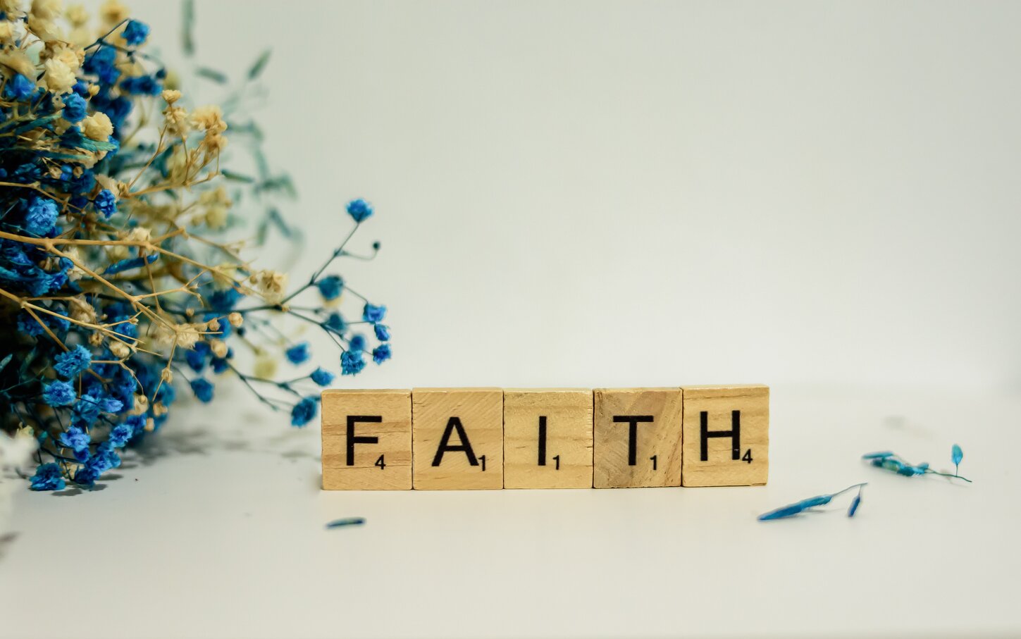 An image of the word "faith" spelt out in letters